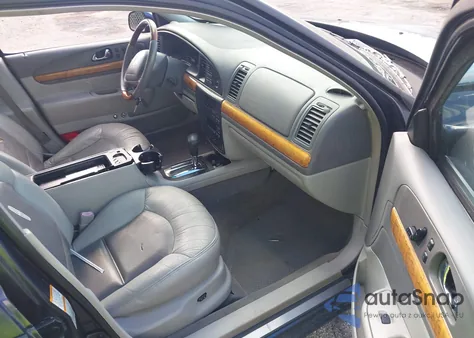 2001 Lincoln Continental из США, поврежденный, VIN 1LNHM97V41Y614240